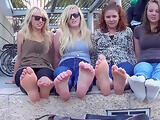Four amateur girlfriends get rid of their shows and display hot feet down town
