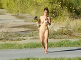 Naked brunette films herself going on treasure hunt nude in public naturist